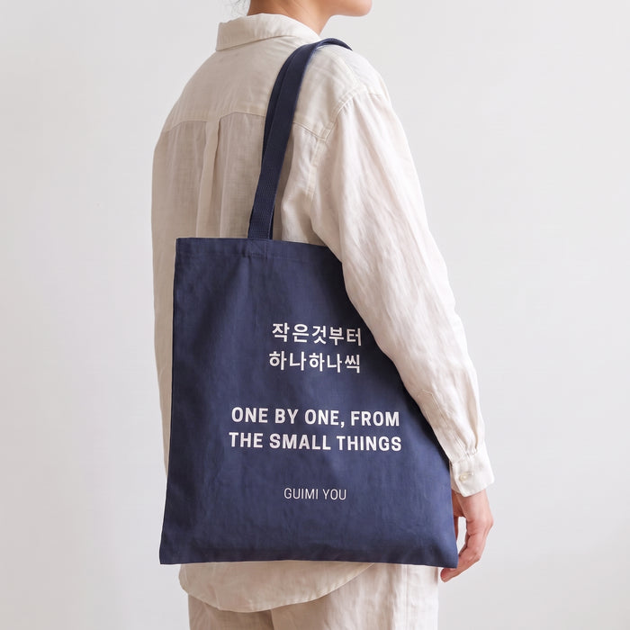 Guimi You — Lasting Words Tote, carried on shoulder